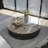 Modern simple round rock table-110266407