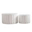 Ensemble de tables basses rondes festonnées blanches-446974062