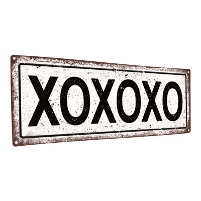 «Xoxoxo» sur métal