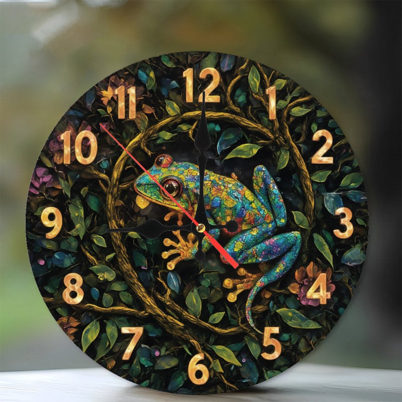 Horloge avec grenouille et feuillage