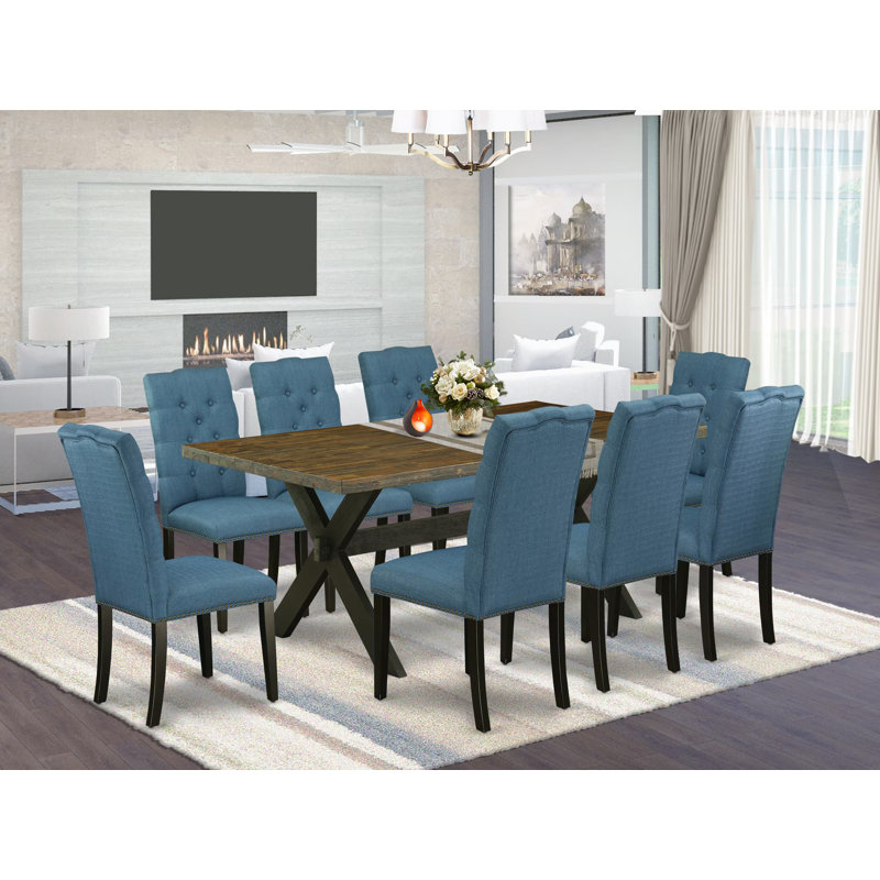 Ensemble de table de salle à manger 9 pièces moderne comprenant une table rectangulaire en bois avec pieds en X et 8 chaises de salle à manger Parson en tissu bleu, noir brossé