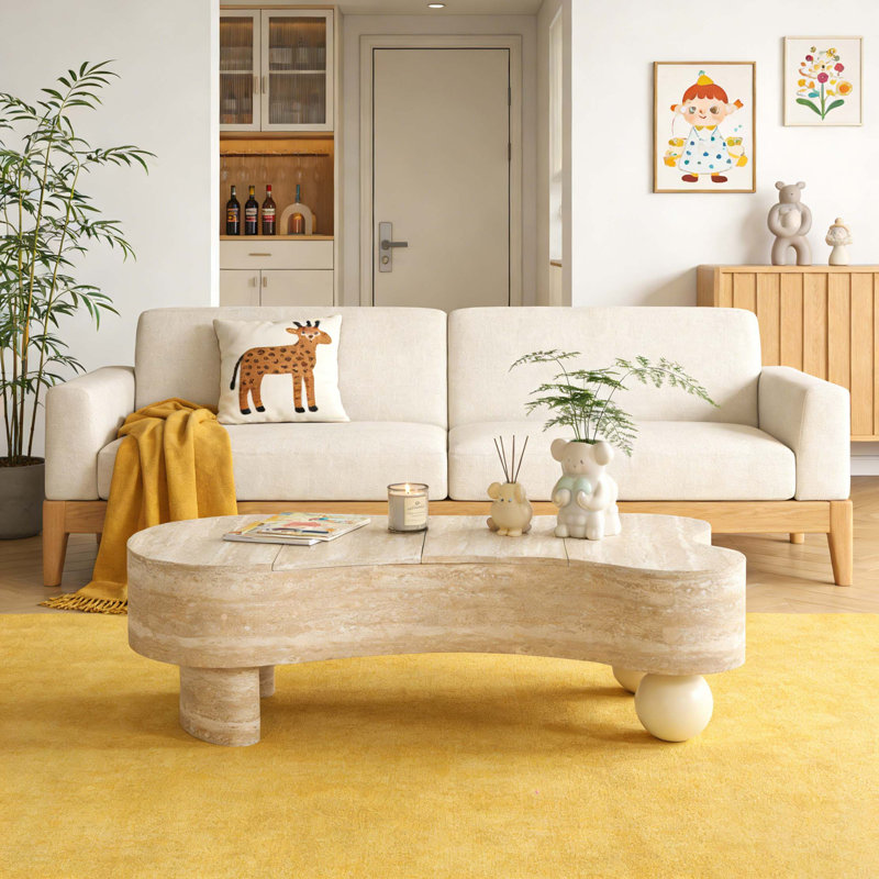 Table basse irrégulière avec plateau rabattable et rangement caché