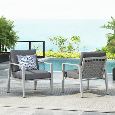 Aluminum Lounge Chair With Sleek Rope Accents And Comfortable Cushions, Perfect For Modern Outdoor And Indoor Spaces