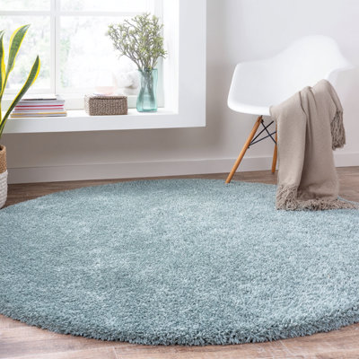 Tapis bleu marine à poils longs tissé à la main Joellen
