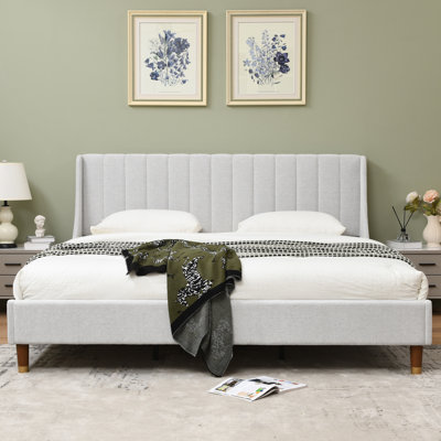 Linvel Upholstered Wingback Platform Bed