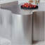 Table basse en acier inoxydable avec une silhouette en forme de couronne