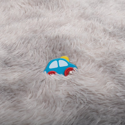 Light gray shag area rug