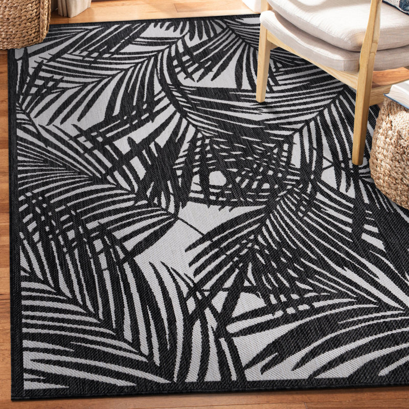 Anjalie Floral Machine Woven Polypropylene Indoor / Outdoor Area Rug in Black/Gray, Rectangle 7'10" x 10'
