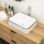 Lavabo vasque de salle de bain 19 po x 15 po en céramique blanche Esmund