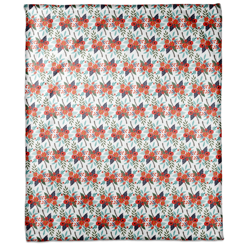 Jeté en molleton orange à motif floral