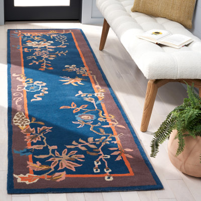 Seydou Hand Tufted Wool/Cotton Floral Rug in Navy/Brown
