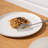 White embossed mesh pattern stoneware dinnerware set, 16 pieces, suitable for four people.