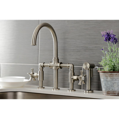 Kingston Brass Hamilton Two-Handle 4-Hole Deck Mount Industrial Style Bridge Kitchen Faucet with Brass Side Sprayer