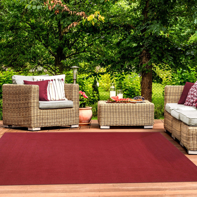 Neufeld Hand-Braided Indoor/Outdoor Burgundy Area Rug
