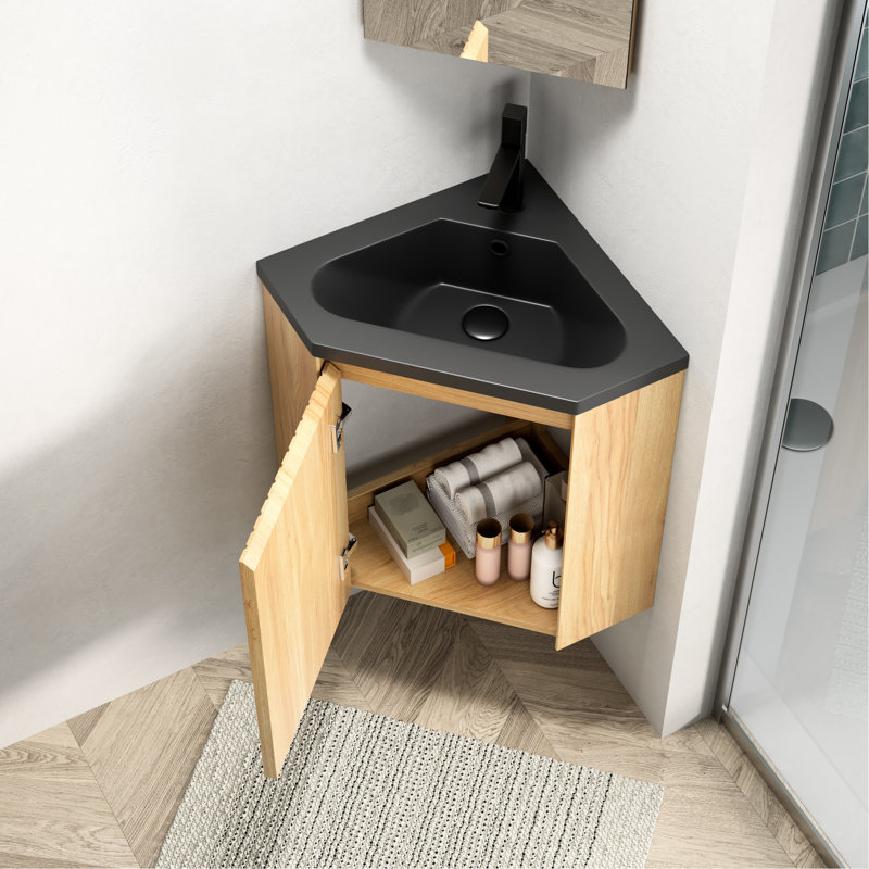 Meuble-lavabo suspendu triangulaire en résine noire intégrée de 76 cm (30 po), avec lavabo intégré et une porte. Rangement en contreplaqué naturel pour les petits coins de salle de bain et les espaces restreints.