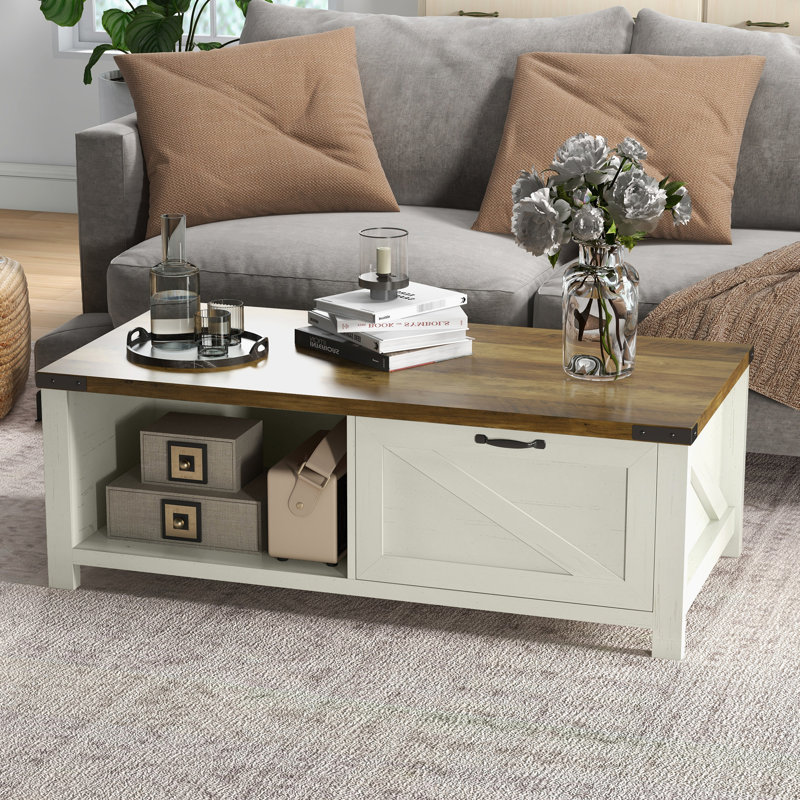 Table basse blanche rustique avec beaucoup de rangement, rehaussant l'esthétique du salon en blanc, tablette ouverte et tiroir