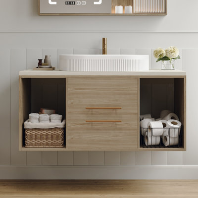 Meuble-lavabo mural avec lavabo ovale en céramique, armoire en bois massif multi-couches, tiroirs à fermeture en douceur et rangement ouvert pour des salles de bain modernes et peu encombrantes