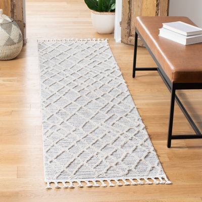 Claudie Geometric Area Rug