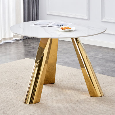 de table ronde en pierre à grain de marbre blanc avec pieds en acier inoxydable plaqué or - conception élégante et écologique