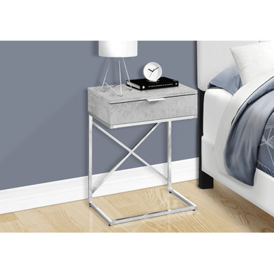 Table d'appoint avec structure en X chromée