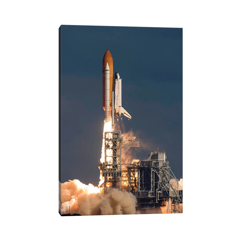 Space Shuttle Atlantis Clears The Tower At The Kennedy Space Center by Rob Edgcumbe - Wrapped Canvas Print