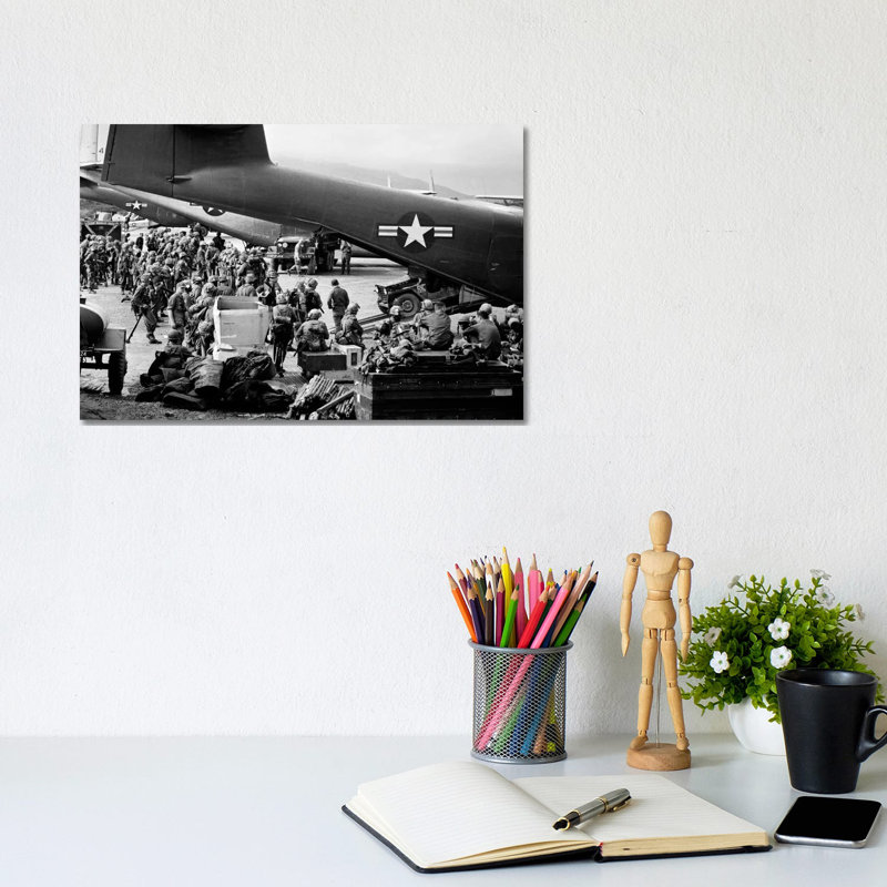 1960s Military Personnel Gathered Under Tails Of Planes In Airfield by Vintage Images - Wrapped Canvas Print