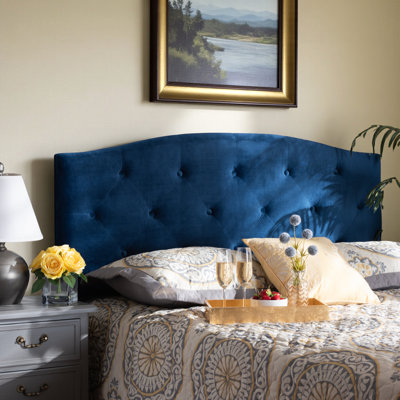 Xylo is a modern and contemporary navy blue velvet fabric headboard that is upholstered in wood. by House of Hampton