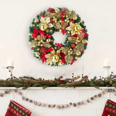 Couronne de Noël artificielle pré-illuminée de 45 cm (18 po), rouge et or, avec nœud, feuilles, boules dorées et baies rouges, 15 DEL étanches, décoration intérieure et extérieure