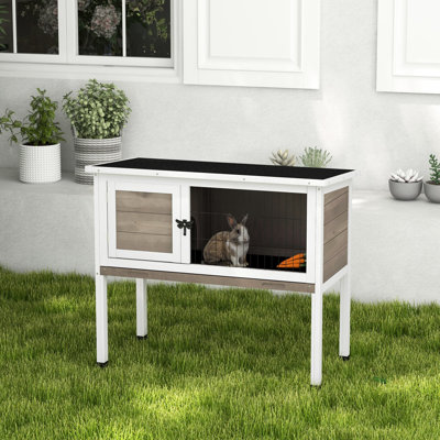 Elevated Wooden Rabbit For Single, Dwarf, Or Guinea Pig, Indoor/outdoor Placement, Brown Color, Hinged Asphalt Roof, Removable Tray, Space Under Stora