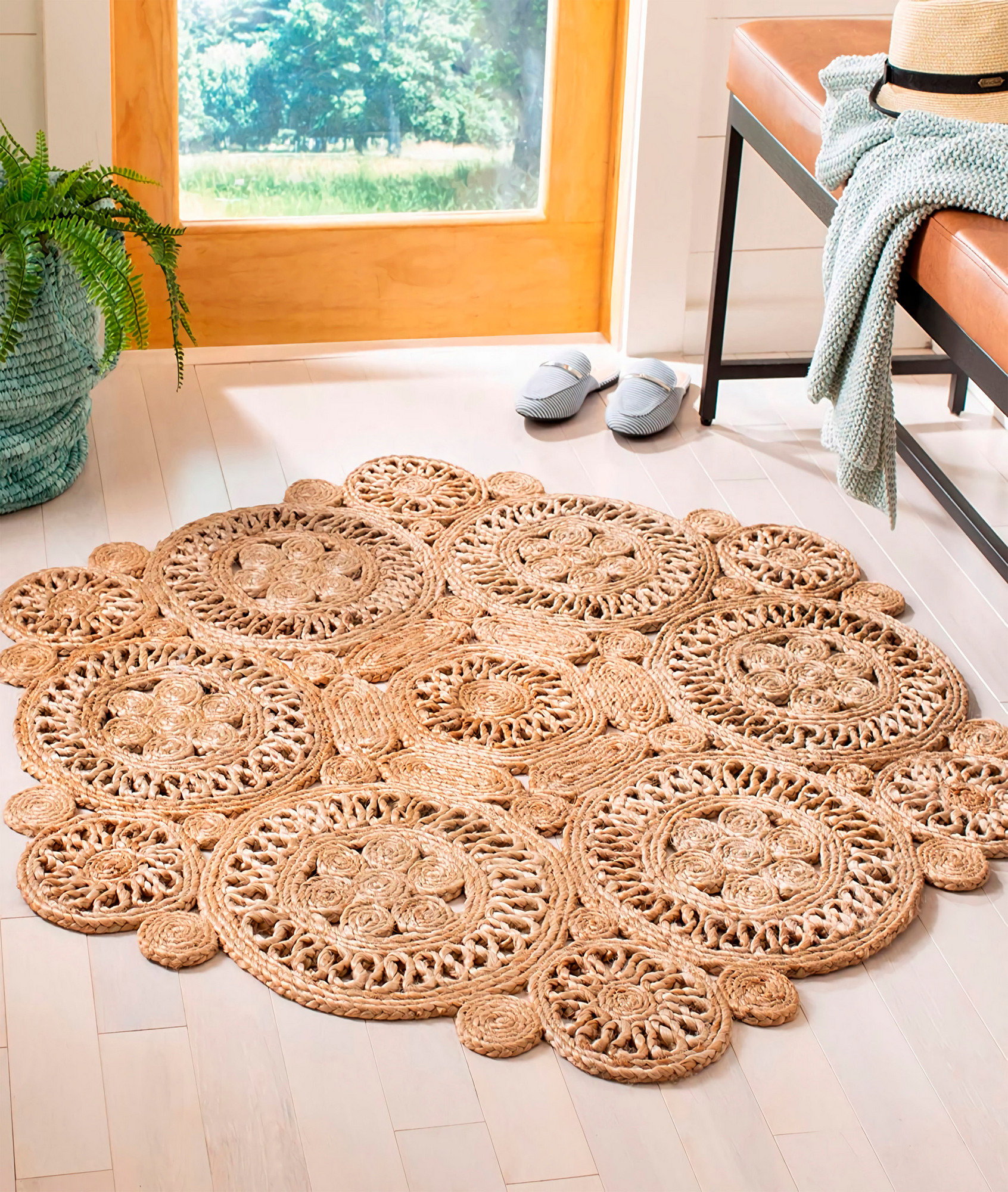 East Urban Home Round Solid Color Handwoven Jute Area Rug in Brown ...