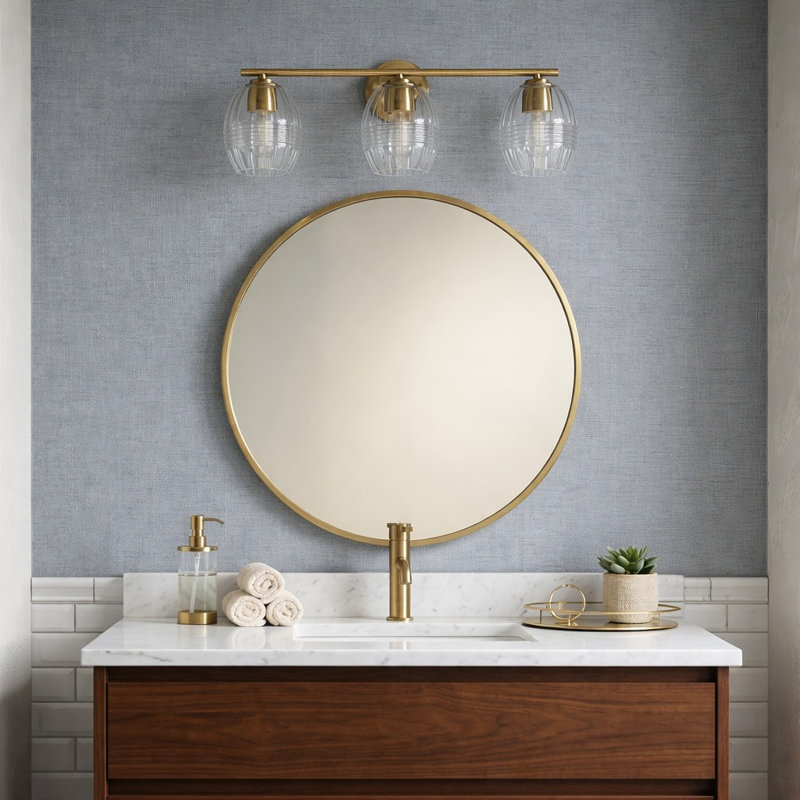 Applique à trois lumières pour meuble-lavabo à bras en verre transparent en laiton satiné