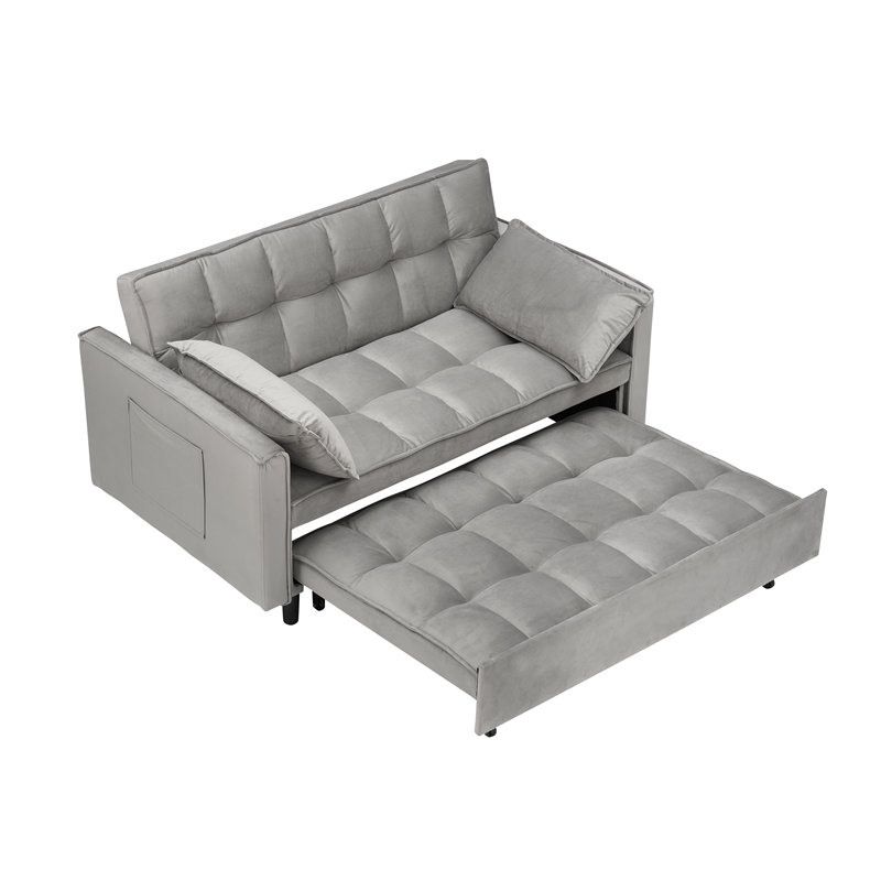Canapé futon convertible polyvalent avec causeuse moderne avec dossier inclinable, coussins décoratifs et poches pour une détente confortable dans le salon.