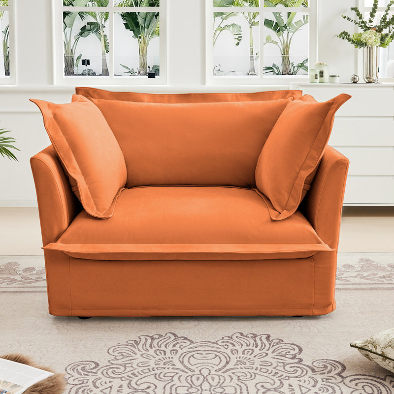 Simple, fauteuil en chenille orange, grand coussin de dossier, coussins décoratifs confortables, housses amovibles, base en bois stable