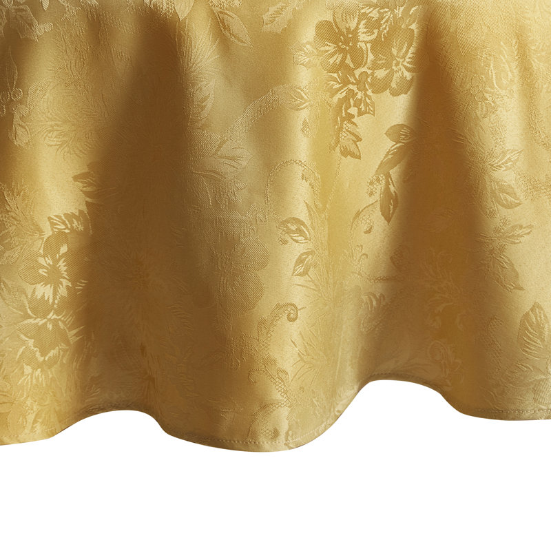 Tilghman Poinsettia Floral Woven Tablecloth, Gold, 70" Round