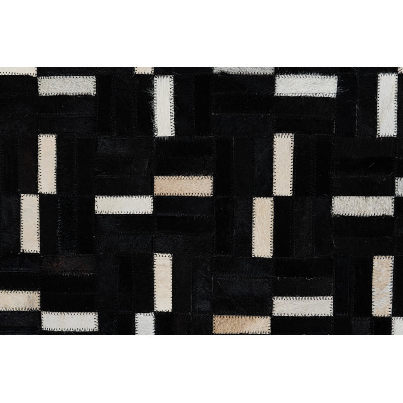 Tapis noir Isidore