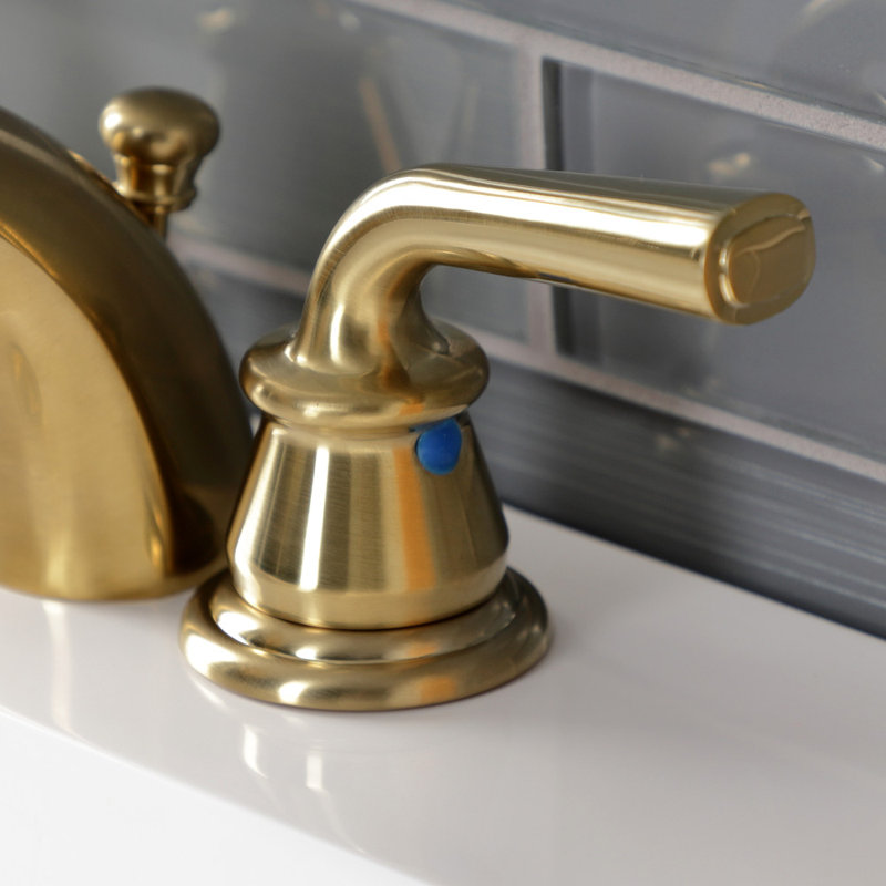 Kingston Brass Restoration Two-Handle 3-Hole Deck Mount Mini-Widespread Bathroom Faucet with Plastic Pop-Up, Brushed Brass