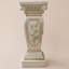 Piédestal d'exposition sculpté en forme de colonne romaine de motifs floraux