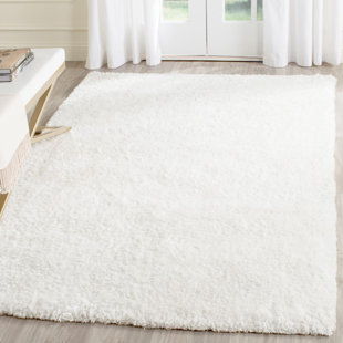 Chamiyah Shag Hand Tufted Performance Solid Color Rug