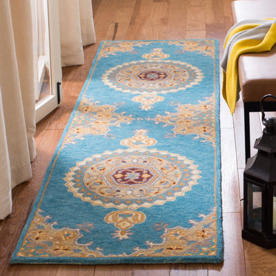 Clavene Hand Tufted Wool/Cotton Oriental Rug in Yellow/Blue