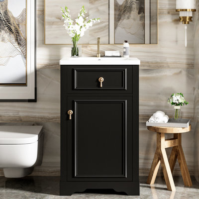 Meuble-lavabo compact de 20 pouces avec lavabo en céramique, structure en bois massif et tablette ajustable. Petit espace amélioré. Attrait moderne. Porte à fermeture en douceur, tablette. Porte-porte. Finition noire.