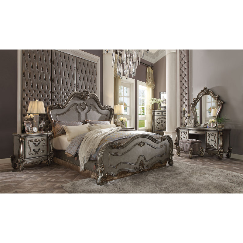 Regal Elegance Queen Bed with Carved Scrollwork and Storage Drawers