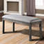 Banc de salle à manger de couleur grise, siège rembourré en tissu, bois massif, finition rustique intrigante en métal brossé