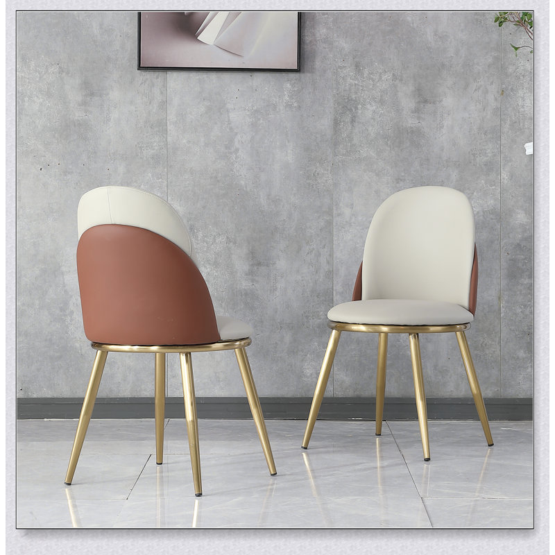 Ensemble de 2 chaises de salle à manger modernes en cuir synthétique avec pieds en métal doré pour des sièges élégants et confortables dans n'importe quelle pièce