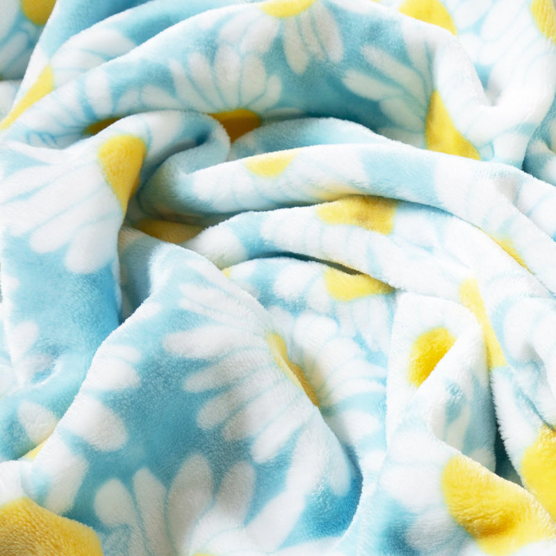 Jeté en peluche Flower Power , Motif de marguerites bleu clair