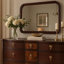 Commode Raam, 9 tiroirs, pieds dorés, brun cerise foncé