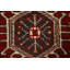 Tapis rouge à motif géométrique 3x8