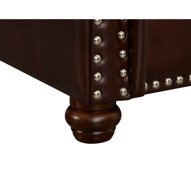 Salon en superbe similicuir bourgogne, fabrication et coussins confortables - couleur des pieds en bois massif brun