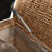 Boatwright 56'' W Flip Compartment Storage Rattan Upholstered Bench with Two Pillows and Solid Wood Feet