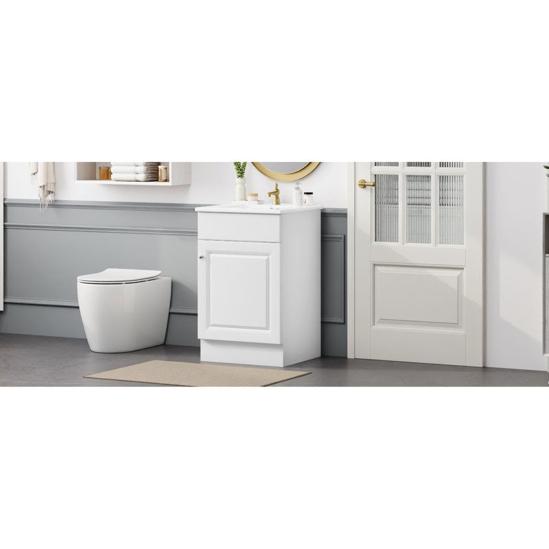 Meuble-lavabo de 50 cm avec lavabo en céramique blanche. Étagère de rangement. Vasque prépercé pour robinetterie et surface lisse. Porte de rangement pratique. Finition silencieuse.