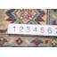 Tapis rouge à motif oriental Kazak